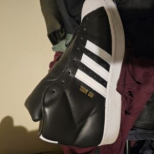 Adidas Black and White Athletic Shoes with Classic Stripes